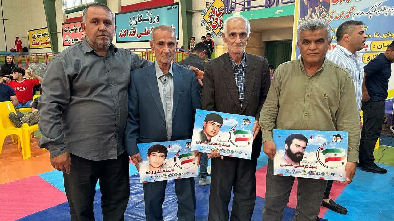 تجلیل از پدران شهدای مفقودالاثر و قهرمانان کشتی در جام شهدای ازباران